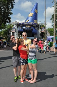 Family Picture in front of Sorerer's Hat in Disney's Hollywood Studios